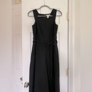 Black jumper with tie waist and zip back.